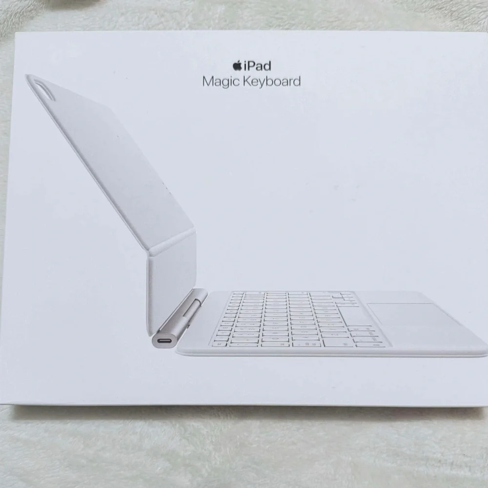 Apple Keyboard with White and Black Design